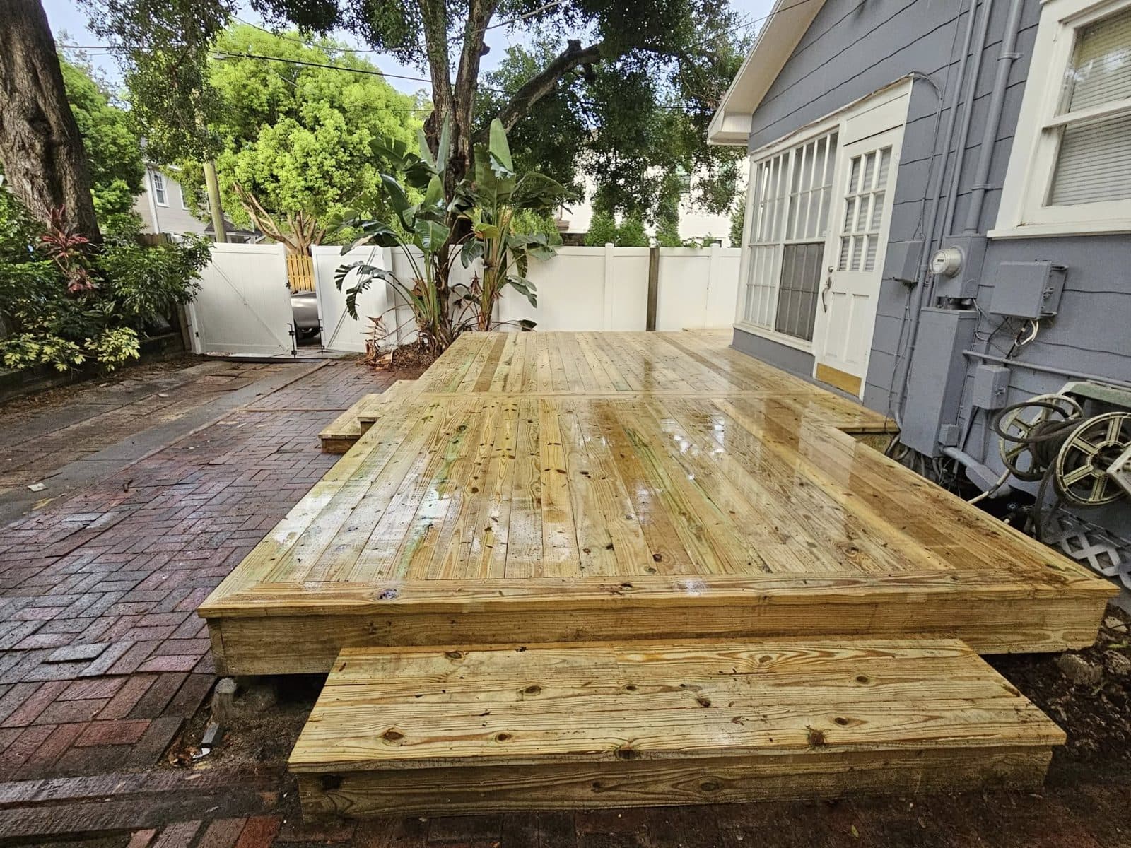 Angled view of the finished deck boards and step