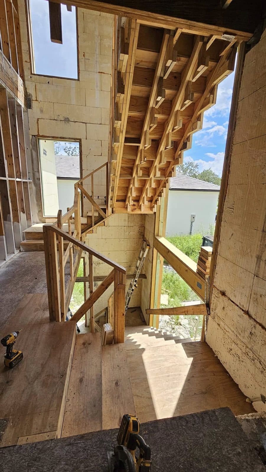Interior framing and stair structure during a build