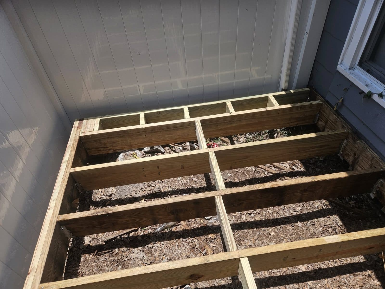 Floor joist and subfloor framing inside a structure